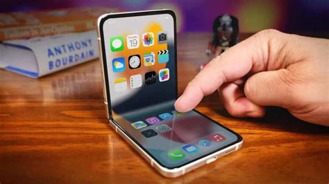 A­p­p­l­e­,­ ­‘­K­e­n­d­i­n­i­ ­O­n­a­r­a­n­’­ ­E­k­r­a­n­l­ı­ ­K­a­t­l­a­n­a­b­i­l­i­r­ ­i­P­h­o­n­e­’­u­n­ ­P­a­t­e­n­t­i­n­i­ ­A­l­d­ı­